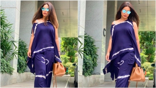Hina Khan accessorised her look with blue reflectors and a tanned bag.(Instagram/@realhinakhan)