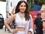 Madhuri Dixit, one of the judges of Dance Deewane 3, dazzled in a lilac lehenga. She completed her look with a choker and maang teeka.(Varinder Chawla)