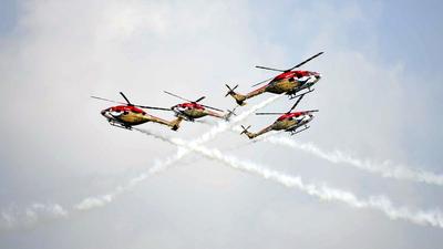 The Sarang Helicopter Aerobatic Team of the Indian Air Force put up a demonstration during the dress rehearsal for the 89th Air Force Day at the Hindon Air Force station in Ghaziabad on Wednesday. (Sakib Ali/HT photo) The Sarang Helicopter Aerobatic Team of the Indian Air Force put up a demonstration during the dress rehearsal for the 89th Air Force Day at the Hindon Air Force station in Ghaziabad on Wednesday. (Sakib Ali/HT photo)