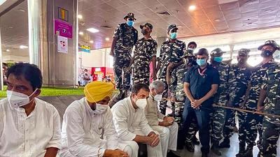 Congress leader Rahul Gandhi along with party leader KC Venugopal, Punjab CM Charanjit Singh Channi and Chhattisgarh CM Bhupesh Baghel at Lucknow airport, UP, to meet families of farmers who lost their lives in Lakhimpur Kheri violence. (PTI)