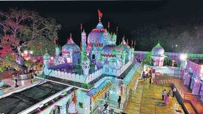 An illuminated Mata Mansa Devi temple on the eve of the Navratris in Panchkula on Wednesday. (Sant Arora/HT)