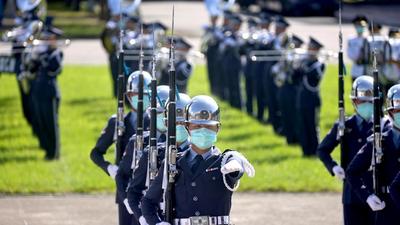 Taiwan honour guards perform during a national day rehearsal in Taipei on Tuesday. Military tension between China and Taiwan, which Beijing says is a breakaway region, has intensified in the last few days with a record number of Chinese fighter aircraft flying into the island’s air defence zone. (REUTERS) Taiwan honour guards perform during a national day rehearsal in Taipei on Tuesday. Military tension between China and Taiwan, which Beijing says is a breakaway region, has intensified in the last few days with a record number of Chinese fighter aircraft flying into the island’s air defence zone. (REUTERS)