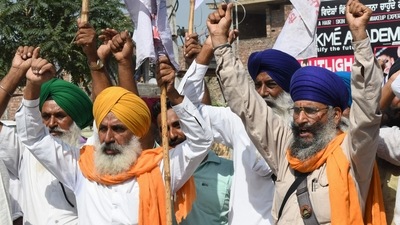 Farmers shout slogans against Prime Minister Narendra Modi and Uttar Pradesh state chief minister Yogi Adityanath during a protest. (AFP) Farmers shout slogans against Prime Minister Narendra Modi and Uttar Pradesh state chief minister Yogi Adityanath during a protest. (AFP)