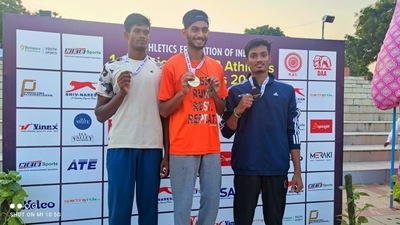 Swadhin Manjhi on podium Swadhin Manjhi on podium