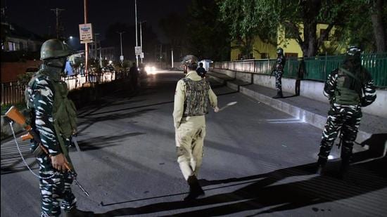 Security personnel cordon off area after owner of a popular pharmacy in Srinagar, Makhan Lal Bindroo, was shot by suspected terrorists in Srinagar on Tuesday. Several little known terror groups have claimed responsibility of civilian killings in Jammu and Kashmir. (Imran Nissar/ANI Photo)