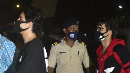 Shah Rukh Khan’s son Aryan Khan and (Black T shirt) and Arbaz Merchant ( Red T shirt) were the first three to be arrested from a cruise ship where the NCB allegedly busted a rave party. (Anshuman Poyrekar/HT Photo)