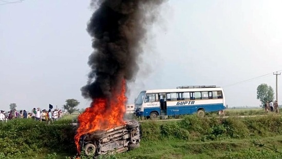 The new 45-second video was clearer than earlier clips that surfaced on Tuesday. It showed a crowd shouting as a Mahindra Thar rams into the crowd. In picture - A vehicle set ablaze after violence broke out during the farmers’ protest in Lakhimpur Kheri district on Sunday.(ANI)