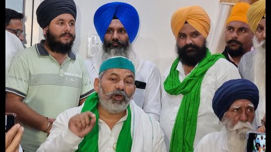 Bharatiya Kisan Union (BKU) leader Rakesh Tikait addressing a press conference in Lakhimpur Kheri on Wednesday. (HT Photo) Bharatiya Kisan Union (BKU) leader Rakesh Tikait addressing a press conference in Lakhimpur Kheri on Wednesday. (HT Photo)