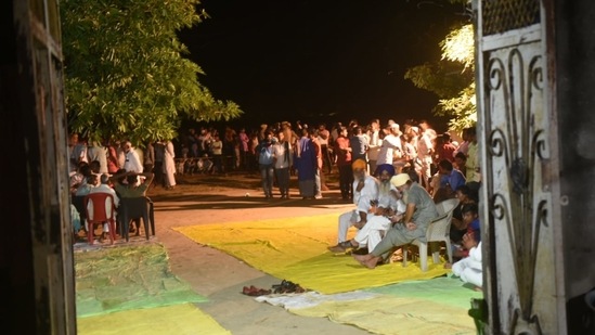 Family members and relatives of Nachhatar Singh waiting for Rahul Gandhi and Priyanka Gandhi Vadra on Wednesday. (Deepak Gupta/Hindustan Times)