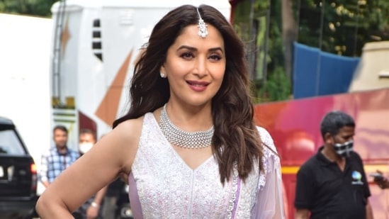 Madhuri Dixit, one of the judges of Dance Deewane 3, dazzled in a lilac lehenga. She completed her look with a choker and maang teeka.(Varinder Chawla)