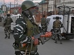 Indian security personnel stand guard near the site where a man was shot dead by unknown gunmen in the Karanagar area of downtown Srinagar on October 2, Indian security personnel stand guard near the site where a man was shot dead by unknown gunmen in the Karanagar area of downtown Srinagar on October 2, 