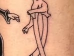 One of the tattoos drawn on skin by a tattoo artist to create a stop-motion animation video.