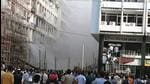 A fire broke out on the first floor of a building at Nehru Place on August 12 this year. The Delhi high court initiated a petition by itself, after it was alleged that emergency vehicles could not reach the spot during to encroachments and lack of ramps. (ANI Photo) A fire broke out on the first floor of a building at Nehru Place on August 12 this year. The Delhi high court initiated a petition by itself, after it was alleged that emergency vehicles could not reach the spot during to encroachments and lack of ramps. (ANI Photo)