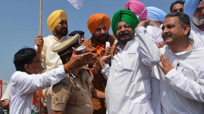 Punjab Congress chief Navjot Singh Sidhu and chief minister Charanjit Singh Channi march towards Uttar Pradesh’s Lakhimpur Kheri district from Mohali on Thursday. (Sant Arora/HT) Punjab Congress chief Navjot Singh Sidhu and chief minister Charanjit Singh Channi march towards Uttar Pradesh’s Lakhimpur Kheri district from Mohali on Thursday. (Sant Arora/HT)
