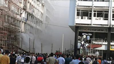 A fire broke out on the first floor of a building at Nehru Place on August 12 this year. The Delhi high court initiated a petition by itself, after it was alleged that emergency vehicles could not reach the spot during to encroachments and lack of ramps. (ANI Photo)