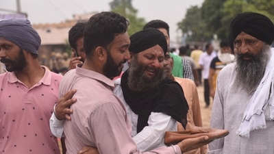 Family members of farmers gather to mourn their death as eight people including farmers were killed in Tikunia, Lakhimpur Kheri. (Deepak Gupta/HT Photo)