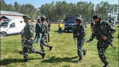 Security personnel arrive at Government Boys Higher Secondary School after terrorist shot dead two teachers at Eidgah Sangam area of Srinagar on Thursday. Terror attacks targeting minorities and non-locals in the Valley have revived memories of the exodus of minority communities that took place in Jammu and Kashmir in the early 1990s. (PTI) Security personnel arrive at Government Boys Higher Secondary School after terrorist shot dead two teachers at Eidgah Sangam area of Srinagar on Thursday. Terror attacks targeting minorities and non-locals in the Valley have revived memories of the exodus of minority communities that took place in Jammu and Kashmir in the early 1990s. (PTI)