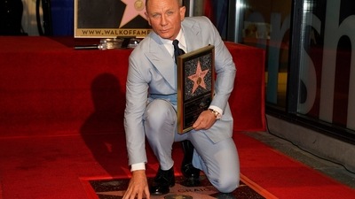 Daniel Craig poses atop his new star on the Hollywood Walk of Fame. (AP) Daniel Craig poses atop his new star on the Hollywood Walk of Fame. (AP)
