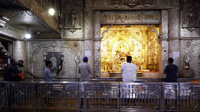 Devotees at Shreemant Dagdusheth Halwai Ganpati temple in Pune, on Thursday. Crowds keep Covid norms and queue up at places of worship in the city. (RAHUL RAUT/HT) Devotees at Shreemant Dagdusheth Halwai Ganpati temple in Pune, on Thursday. Crowds keep Covid norms and queue up at places of worship in the city. (RAHUL RAUT/HT)
