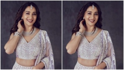 Styled by fashion stylist Tanya Mehta, Madhuri let her tresses open in wavy curls on her one shoulder. She opted for a nude shade of eye shadow, soft maroon lipstick, mascara-laden eyelashes and drawn eyebrows to complete her look. Madhuri Dixit is a joy to behold in this attire. We’re taking notes. (Instagram/@madhuridixitnene) Styled by fashion stylist Tanya Mehta, Madhuri let her tresses open in wavy curls on her one shoulder. She opted for a nude shade of eye shadow, soft maroon lipstick, mascara-laden eyelashes and drawn eyebrows to complete her look. Madhuri Dixit is a joy to behold in this attire. We’re taking notes. (Instagram/@madhuridixitnene)