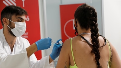 Pfizer announced that a third booster dose will most likely be needed to be administered 6 to 12 months after both doses have been given. (Reuters)