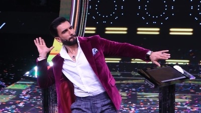 Ranveer Singh dancing on stage. Ranveer Singh dancing on stage.