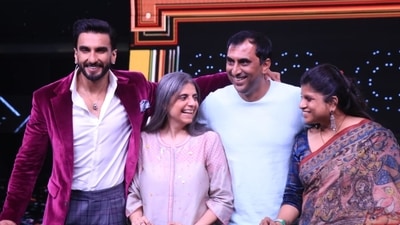 Ranveer and others posing for photos. Ranveer and others posing for photos.