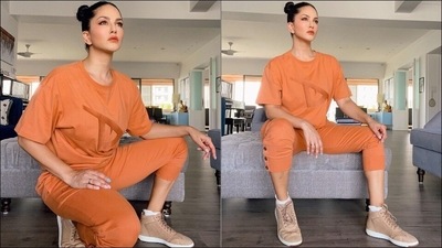 Dropping a new look each day from the newly launched collection, Sunny was recently shooting at home when she was cutely photobombed by her son. The diva donned a unisex oversized T-shirt that was designed to give the wearer their space and comfort and came with a wide ribbed neckline, drop shoulders and chest embroidery. (Instagram/sunnyleone) Dropping a new look each day from the newly launched collection, Sunny was recently shooting at home when she was cutely photobombed by her son. The diva donned a unisex oversized T-shirt that was designed to give the wearer their space and comfort and came with a wide ribbed neckline, drop shoulders and chest embroidery. (Instagram/sunnyleone)
