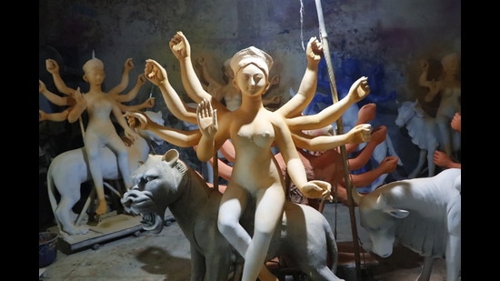 Durga idol makers in Delhi’s popular Chittaranjan Park face challenges like pricey raw material and less orders, this festive season. (Photo: Dhruv Sethi/ HT)