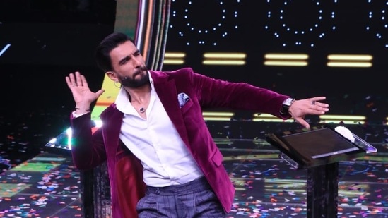 Ranveer Singh dancing on stage.