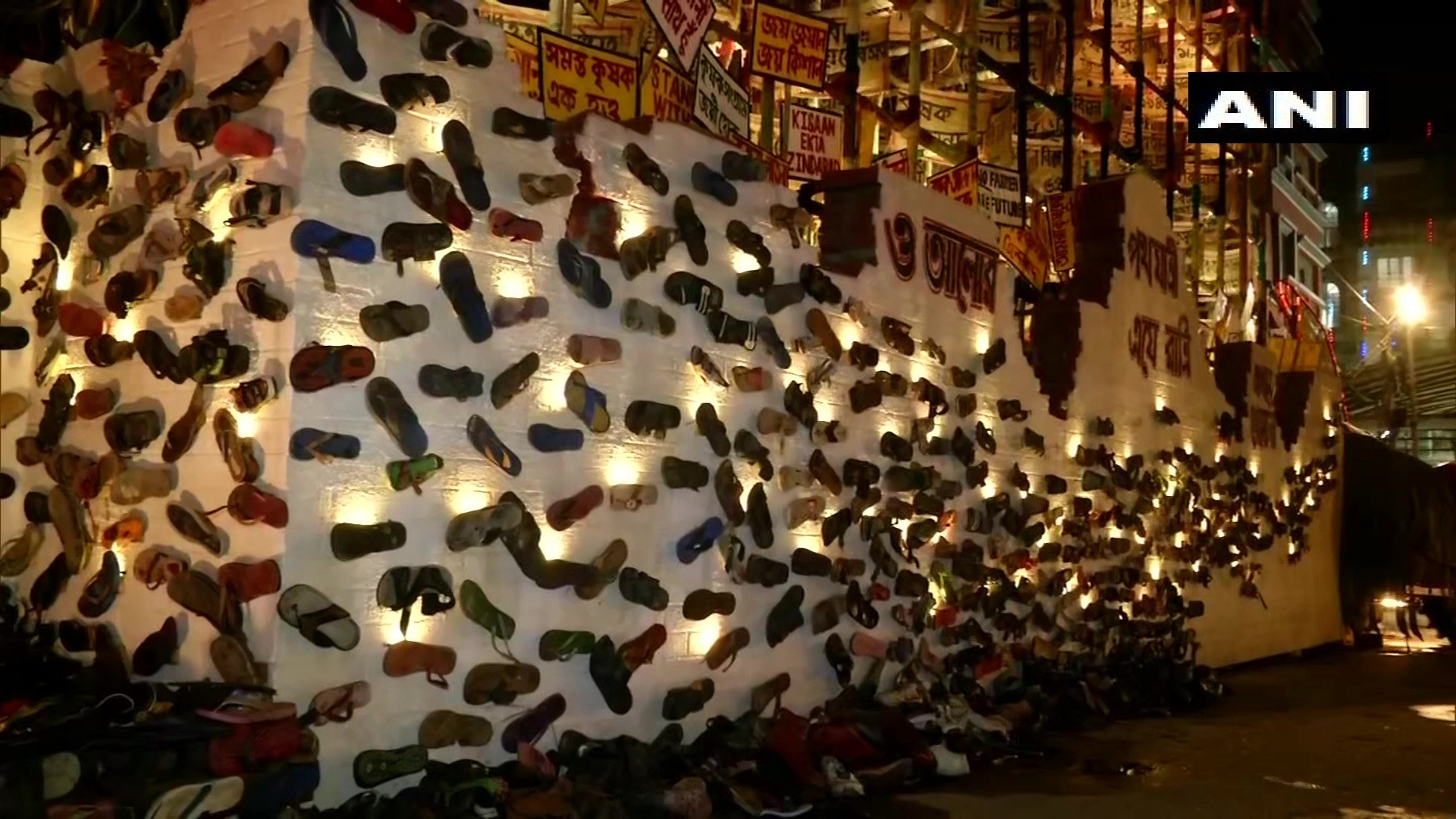 Slippers on the walls of the Durga Puja pandal symbolise the scenes from protest in which they face police action. (ANI)