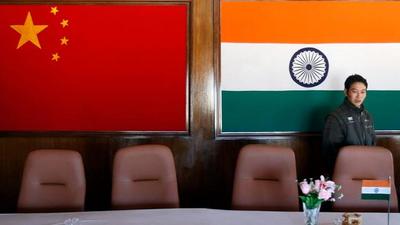 A man walks inside a conference room used for meetings between military commanders of China and India, at the Indian side of the Indo-China border at Bumla, in the northeastern state of Arunachal Pradesh, in this file photo. (REUTERS) A man walks inside a conference room used for meetings between military commanders of China and India, at the Indian side of the Indo-China border at Bumla, in the northeastern state of Arunachal Pradesh, in this file photo. (REUTERS)