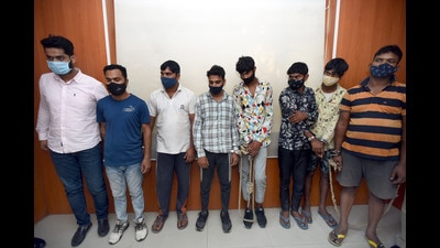 The eight suspects in the police custody in Noida on Friday. (Sunil Ghosh/HT) The eight suspects in the police custody in Noida on Friday. (Sunil Ghosh/HT)