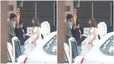 In the pictures clicked by paparazzi, Ileana can be seen engrossed in giving her shots, while looking elegant in a long spotless white dress. (HT Photos/Varinder Chawla) In the pictures clicked by paparazzi, Ileana can be seen engrossed in giving her shots, while looking elegant in a long spotless white dress. (HT Photos/Varinder Chawla)