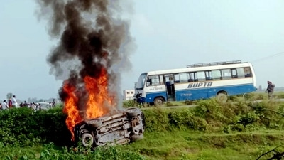 A vehicle set ablaze after violence broke out after farmers agitating were allegedly run over by a vehicle in the convoy of a union minister, in Lakhimpur Kheri. (PTI) A vehicle set ablaze after violence broke out after farmers agitating were allegedly run over by a vehicle in the convoy of a union minister, in Lakhimpur Kheri. (PTI)