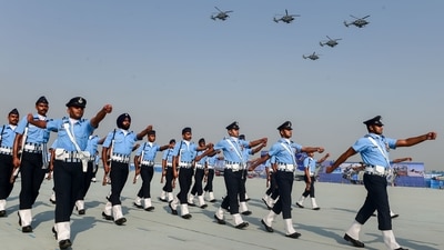 Indian Air Force (IAF) personnel march past as IAF helicopters perform an air display during 89th foundation day of the force, at Hindan Airbase in Ghaziabad. (PTI Photo/Kamal Kishore) Indian Air Force (IAF) personnel march past as IAF helicopters perform an air display during 89th foundation day of the force, at Hindan Airbase in Ghaziabad. (PTI Photo/Kamal Kishore)