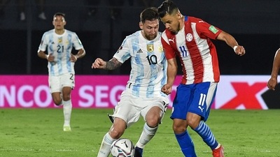 Argentina's Lionel Messi (L) and Paraguay's Angel Romero (R) vie for the ball. (Getty) Argentina's Lionel Messi (L) and Paraguay's Angel Romero (R) vie for the ball. (Getty)