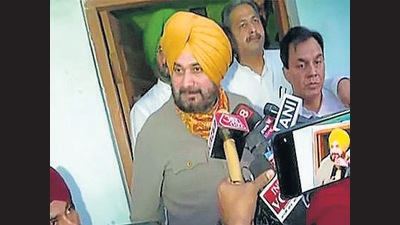 Punjab Congress chief Navjot Singh Sidhu speaking to reporters after visiting the residence of slain journalist Raman Kashyap in Lakhimpur Kheri on Friday. (ANI Photo) Punjab Congress chief Navjot Singh Sidhu speaking to reporters after visiting the residence of slain journalist Raman Kashyap in Lakhimpur Kheri on Friday. (ANI Photo)