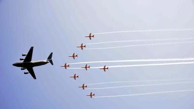 A Globemaster heavy lift aircraft followed by a team of nine aircraft from the ‘Suryakiran’ aerobatic team demonstrated the ‘Tiranga’ formation, celebrating 75 years of India’s independence. (Sakib Ali/HT Photo) A Globemaster heavy lift aircraft followed by a team of nine aircraft from the ‘Suryakiran’ aerobatic team demonstrated the ‘Tiranga’ formation, celebrating 75 years of India’s independence. (Sakib Ali/HT Photo)