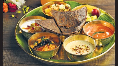 Navratri thali with scrumptious food spread Navratri thali with scrumptious food spread
