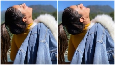 Hina accessorised her look of the day with an animal printed silk bow tie. Her denim jacket has a dramatic white fur collar which added to the winter vibes of the picture. (Instagram/@realhinakhan)