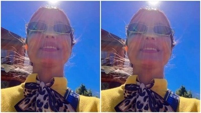 Hina added tinted shades and posed for a selfie with natural sunlight on her face. (Instagram/@realhinakhan)