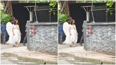 Ileana was seen walking down the pavement as she gave her shot in angelic wings, the long white dress and straight shoulder-length tresses left open. (HT Photos/Varinder Chawla) Ileana was seen walking down the pavement as she gave her shot in angelic wings, the long white dress and straight shoulder-length tresses left open. (HT Photos/Varinder Chawla)