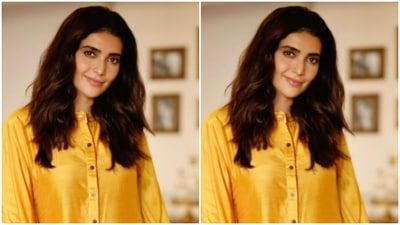 Karishma’s yellow attire is adorned in Mandarin collars and loose sleeves, giving it a festive yet a comfortable look. (Instagram/@karishmaktanna) Karishma’s yellow attire is adorned in Mandarin collars and loose sleeves, giving it a festive yet a comfortable look. (Instagram/@karishmaktanna)