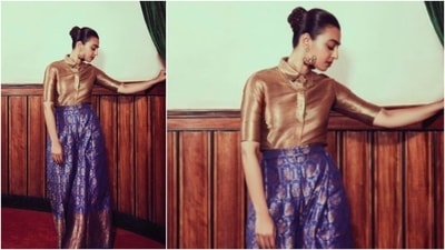 Radhika Apte wore a shiny golden collared blouse which she teamed with printed blue loose trousers. (Instagram/@elevate_promotions)