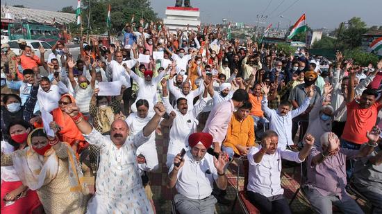BJP workers stage a protest against Pakistan over recent terrorist attacks on civilians in Srinagar's Eidgah Sangam area, in Jammu, on Friday. (PTI)