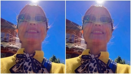 Hina added tinted shades and posed for a selfie with natural sunlight on her face.(Instagram/@realhinakhan)
