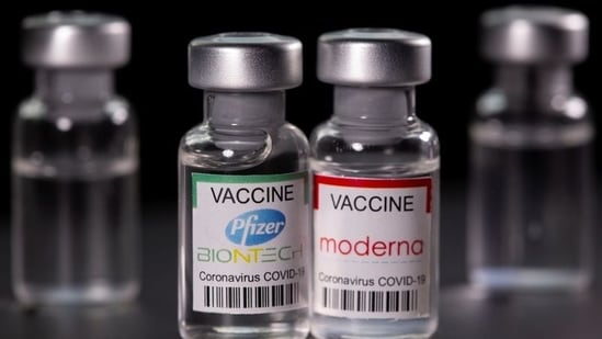 &nbsp;Vials with Pfizer-BioNTech and Moderna coronavirus disease (COVID-19) vaccine labels are seen in this illustration picture taken March 19, 2021.(Reuters)