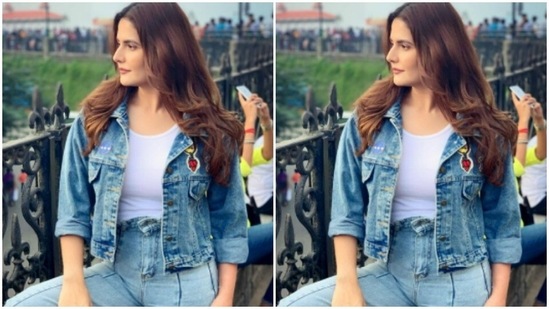 Zareen khan is giving cool vibes as she teamed her white tee shirt with a denim jacket(Instagram/@zareenkhan)