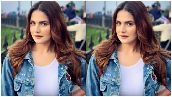 Zareen teamed the classic white and denim ensemble with a denim pair of trousers. The jeans, loose from the ends, are perfect for a winter getaway fashion.(Instagram/@zareenkhan)